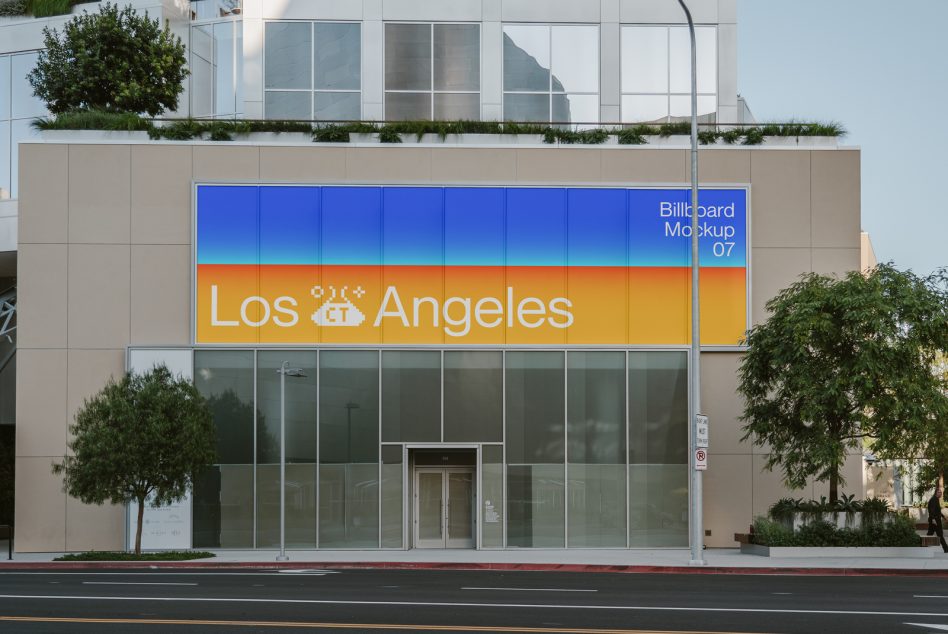 Urban billboard mockup on modern building facade with colorful Los Angeles advertisement, clear sky, ideal for designers graphics display.